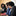 3 ladies sitting at a conference table smiling