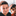 Two young boys making silly faces at the camera