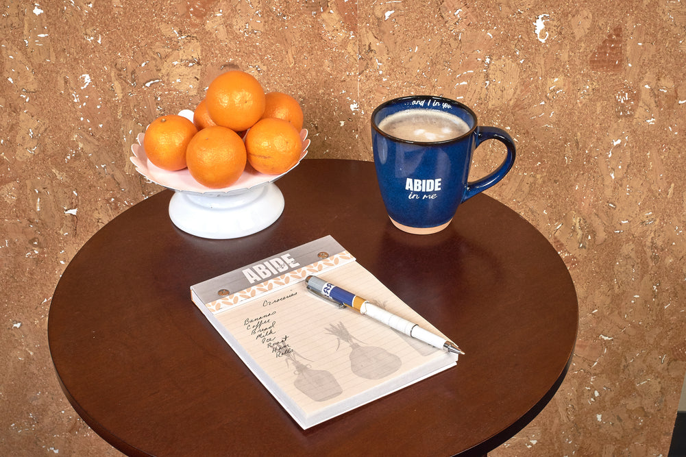Abide with me desk note pad shown on table 