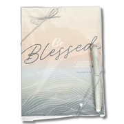 A packaged journal titled 'Be Blessed' with a matching pen, wrapped in clear plastic with a silver ribbon bow, on a white background by CTA Christ to All and CTA Gifts.