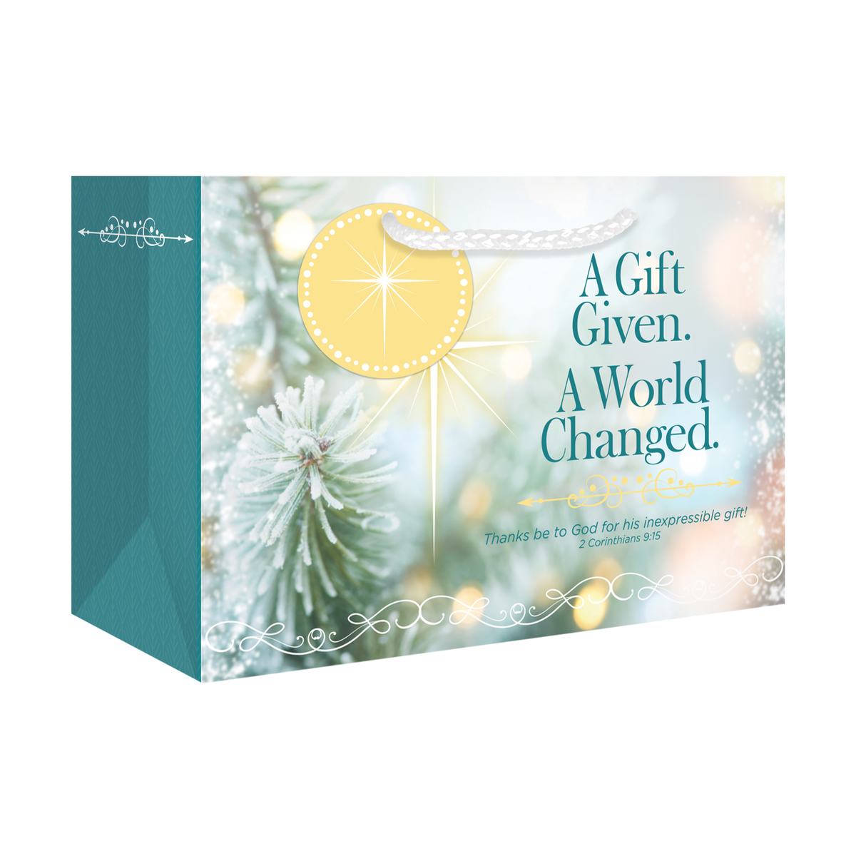 A square gift bag with a festive holiday design, featuring a teal left side panel and a front panel with a soft-focus snowy pine tree, gold starburst, and teal text reading 'A Gift Given. A World Changed by CTA Christ to All & CTA Gifts.