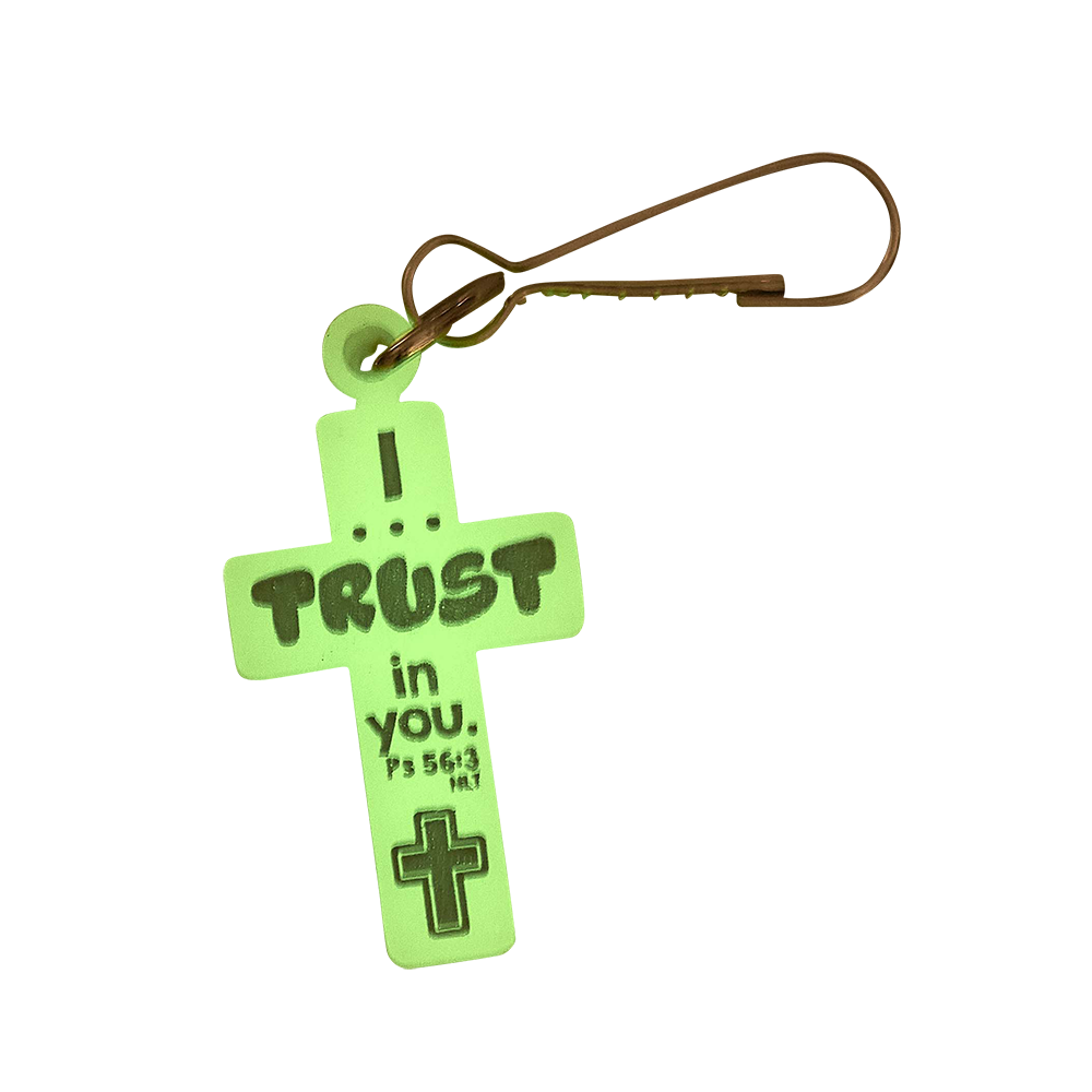 Glow-in-the-dark cross on ciip shown glowing