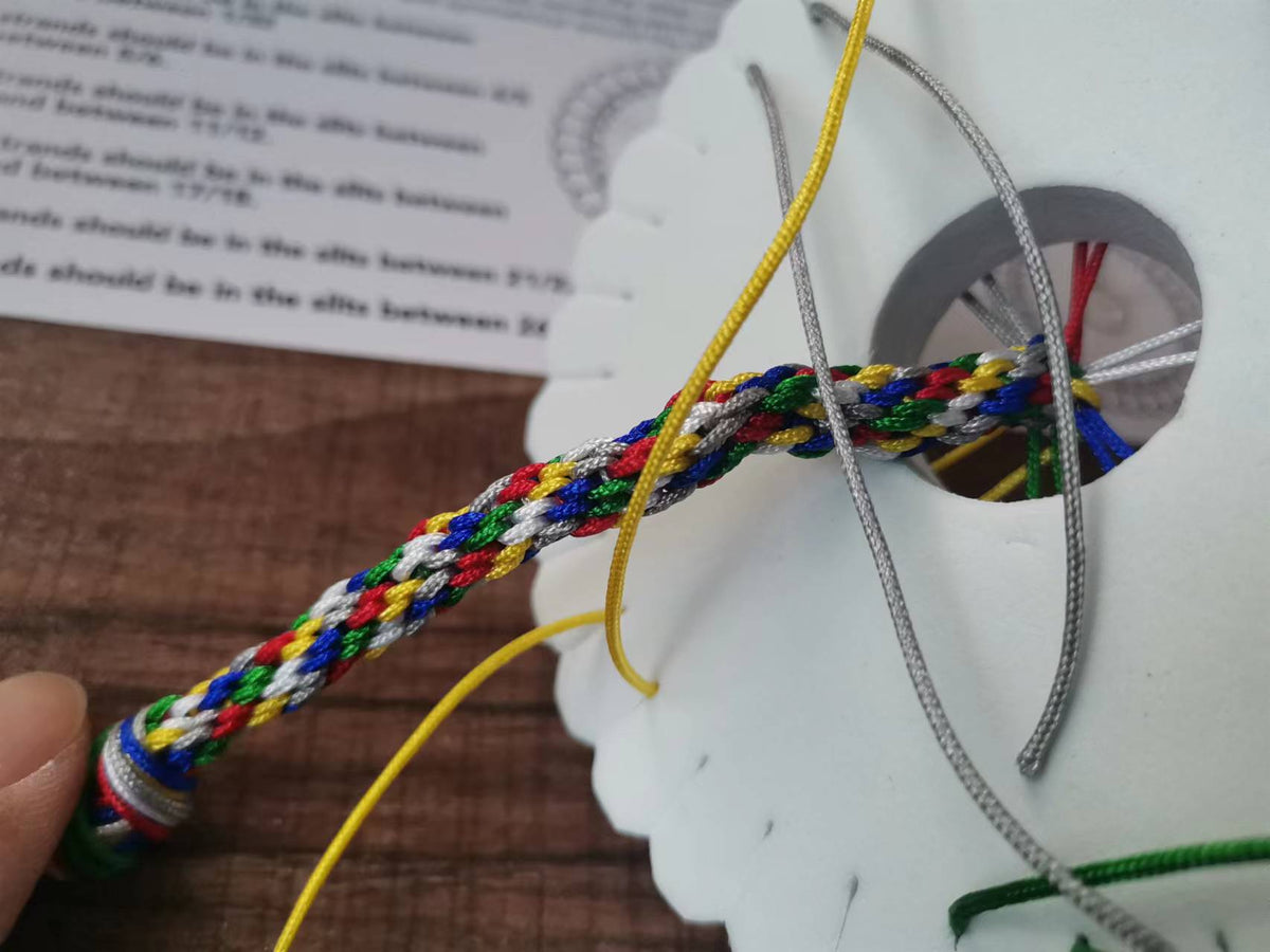 Gospel Story by Colors Bracelet Weaving Kit action shot of weaving being done