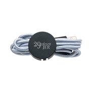 Rope-style charging cable with a branded cap on a white background by CTA Christ to All & CTA Gifts.