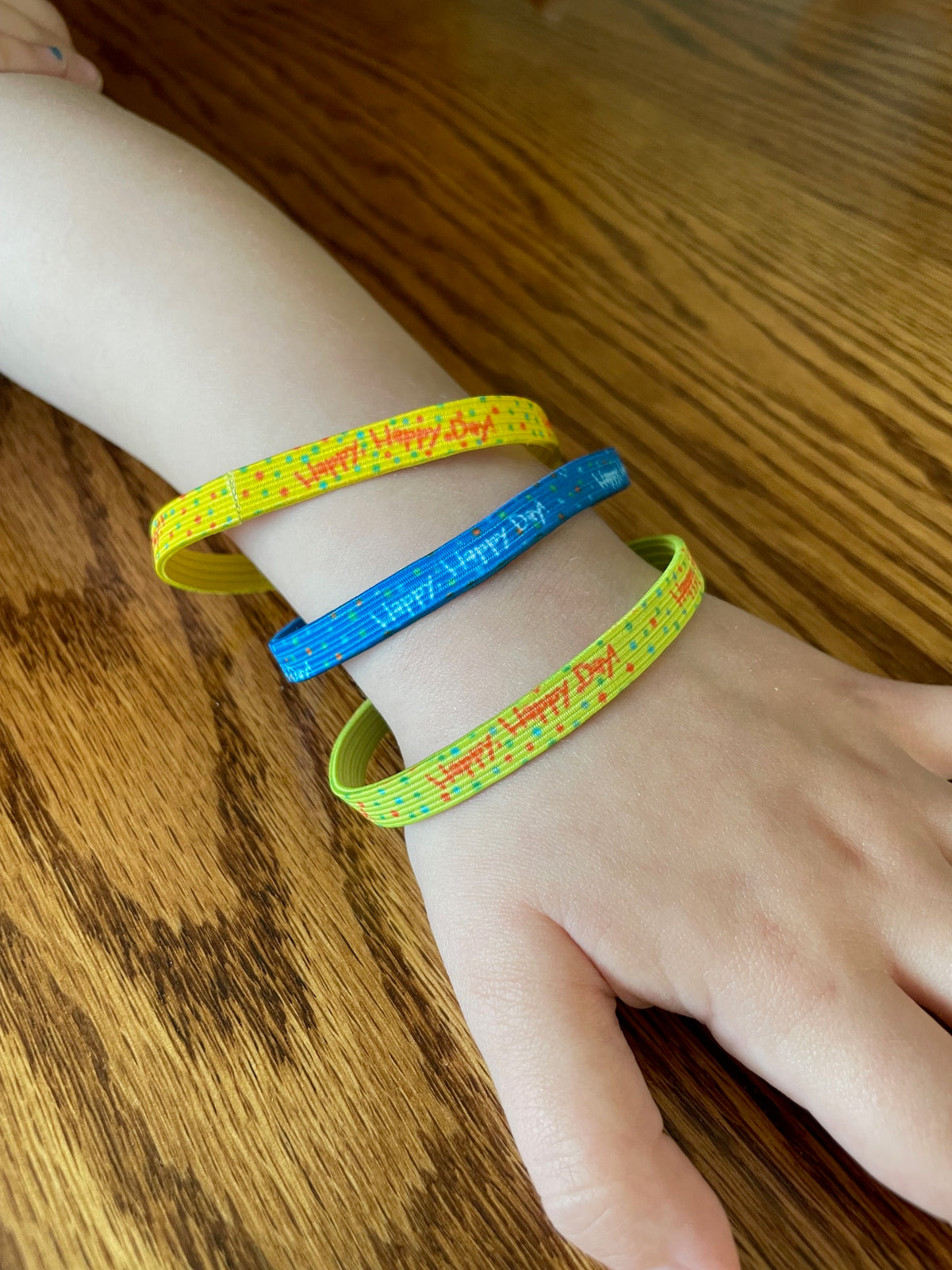 Set of 3 elastic bracelets, 3¾" diameter, in assorted colors with unique designs—one size fits most kids ages 3–12.
615122-17322-0