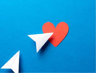 Arrows pointing to heart on blue background