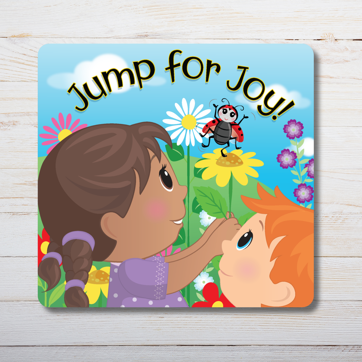 Children's book cover with two children holding hands and a ladybug, titled 'Jump for Joy' by CTA Christ to All and CTAKids.