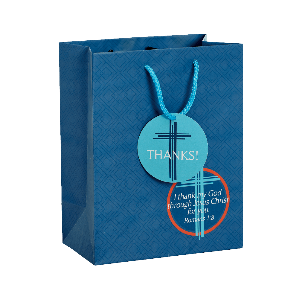 A blue patterned paper gift bag with blue rope handles, featuring a circular light blue 'THANKS!' tag and a red circular tag with a cross design and Bible verse text, shown on a white background by CTA Christ to All & CTA Gifts.