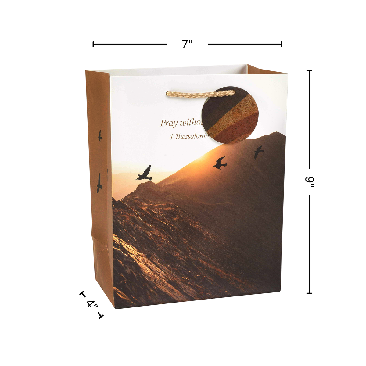 Gift bag with mountain and sunset design, dimensions indicated by CTA Christ to All and CTA Gifts.