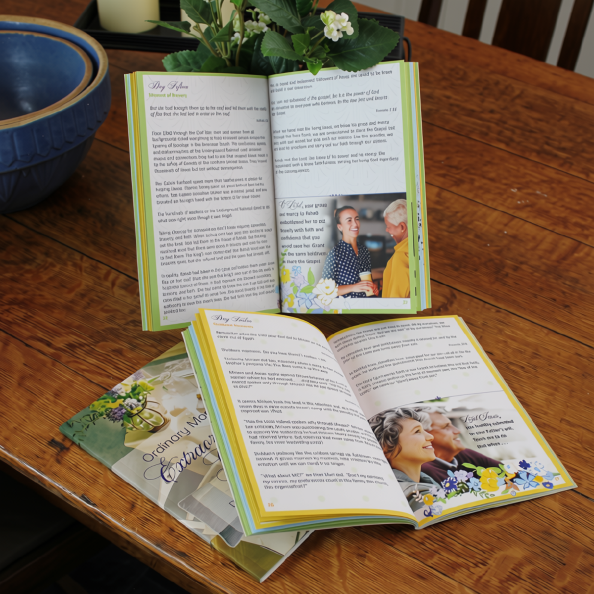 An open printed keepsake or recipe book laid on a wooden table, with additional pages or a booklet partially visible underneath. The book has cream pages with yellow and green border accents and small printed photos of an older couple by CTA Christ to All.
