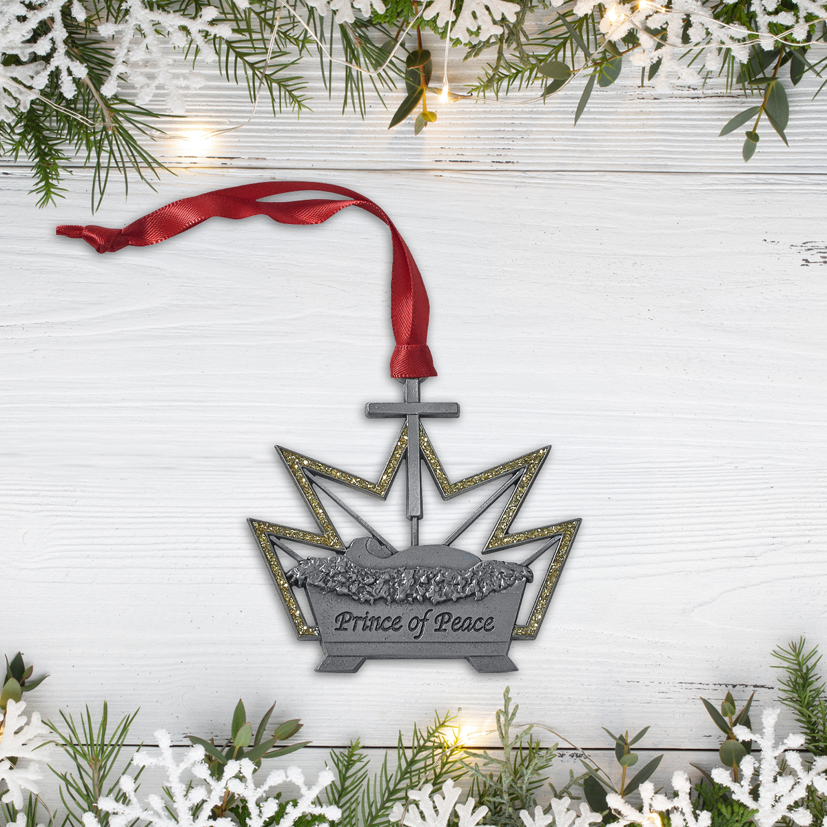Ornaments of Faith® - KJV - Jesus, the Prince of Peace. This beautifully designed pewter-finish ornament honors Jesus as the Prince of Peace and offers a meaningful way to share the Christmas story to ministry staff, volunteers, and community members. The glittering gold crown proclaims Jesus as Prince, while the manger shows his humble, gentle nature.