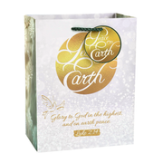 A white and silver glitter gift bag with a gold foil 'Place on Earth' circular design and a green rope handle, featuring the biblical quote Luke 2:14 on the front by CTA Christ to All and CTA Gifts.