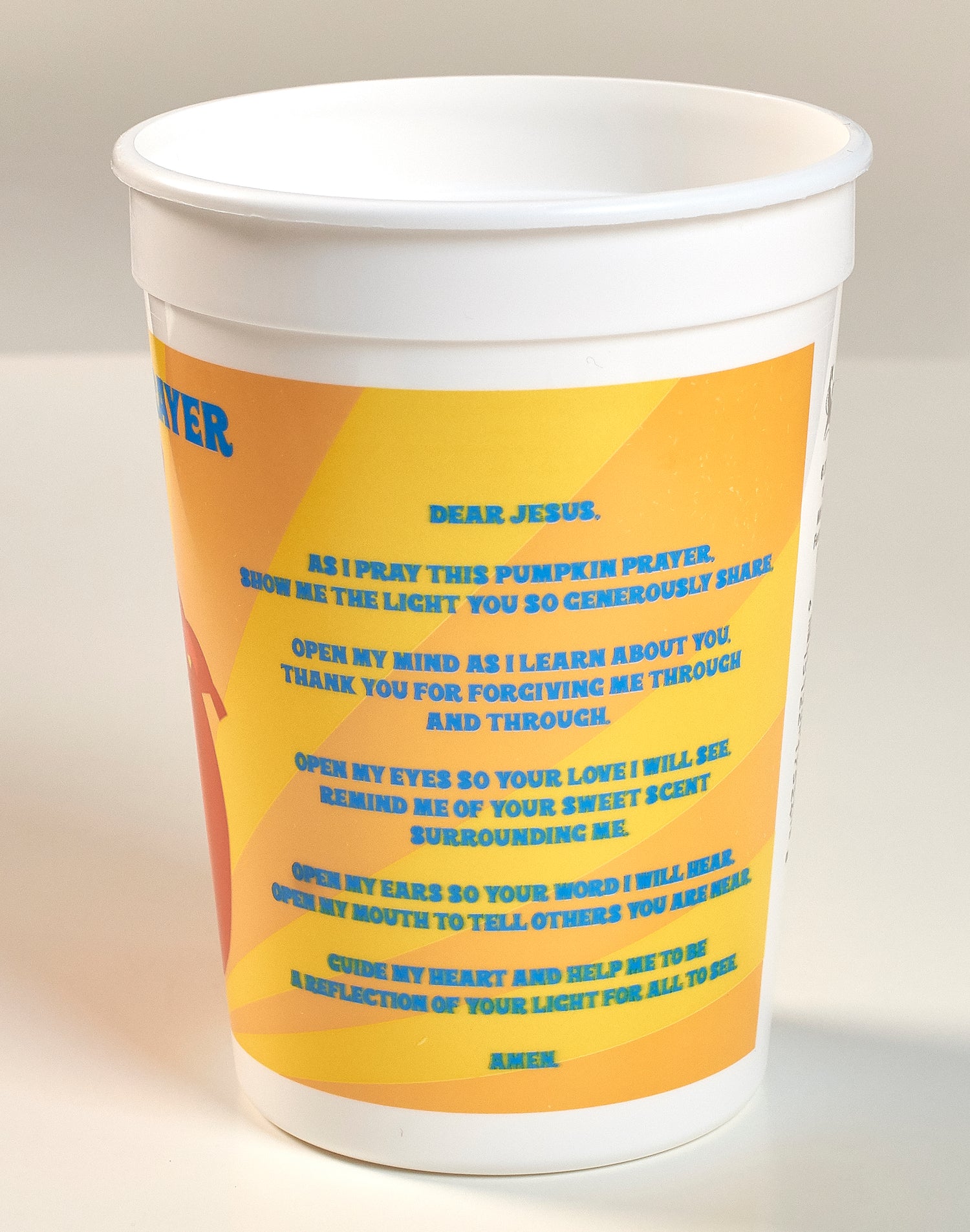 The Pumpkin Prayer text on a plastic tumbler cup for kids