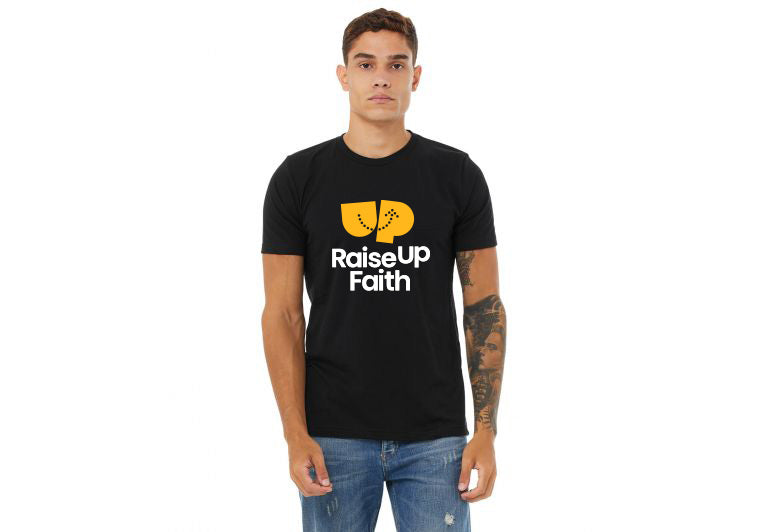 Person wearing a black t-shirt with 'Raise Up Faith' text and logo on a white background by CTA Christ to All & CTA Gifts.