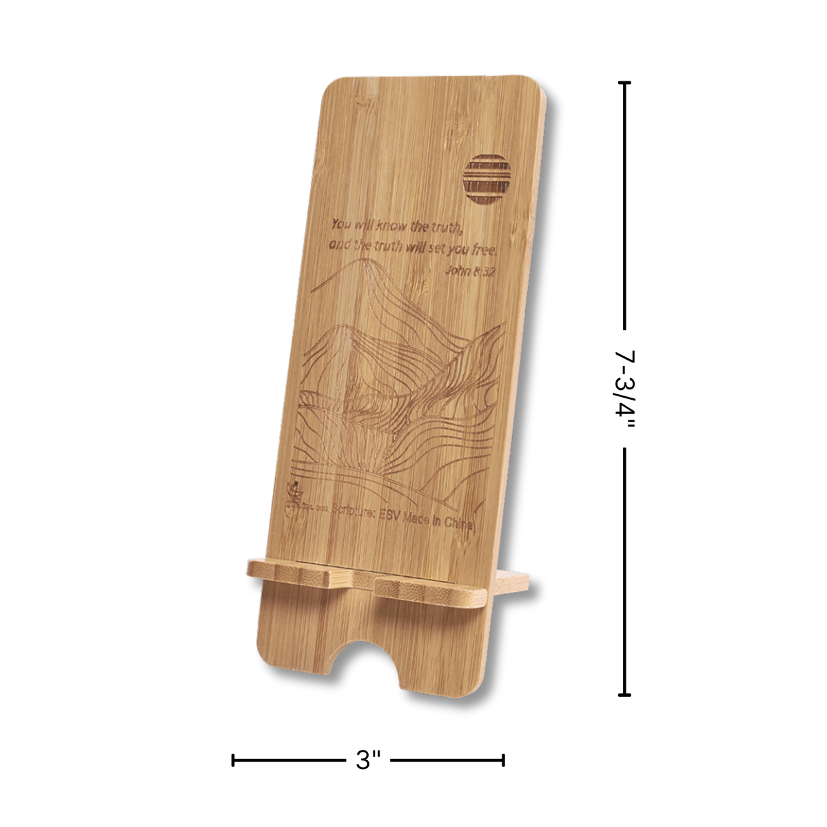 A bamboo phone stand with engraved text and topographic line art, shown with dimension markers indicating 7-3/4 inches in height and 3 inches in width on a white background by CTA Christ to All and CTA Gifts.