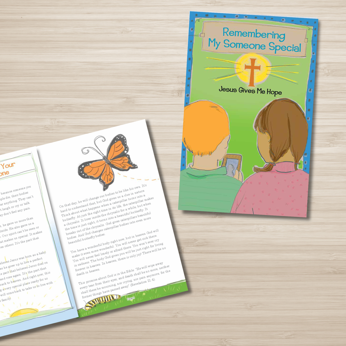 Children's book with a butterfly illustration on a wooden surface by CTA Christ to All & CTAKids.