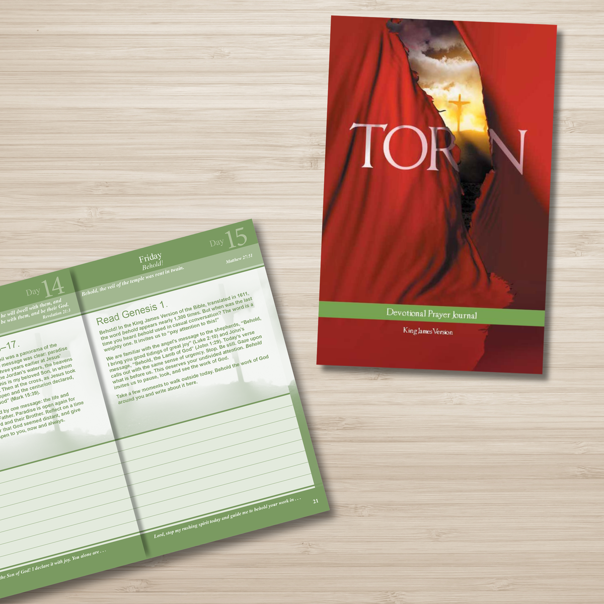 A devotional prayer journal shown open on a light wood surface, with the cover also visible. The cover is predominantly red with a dramatic curtain-like design and the title 'TORN' in large white letters by CTA Christ to All & CTA Publishing.