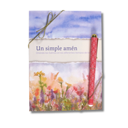 A Spanish-language book or journal titled 'Un simple amén' with a watercolor floral cover, tied with a thin string and accompanied by a red patterned pen, shown on a white background by CTA Christ to All and CTA Gifts.
