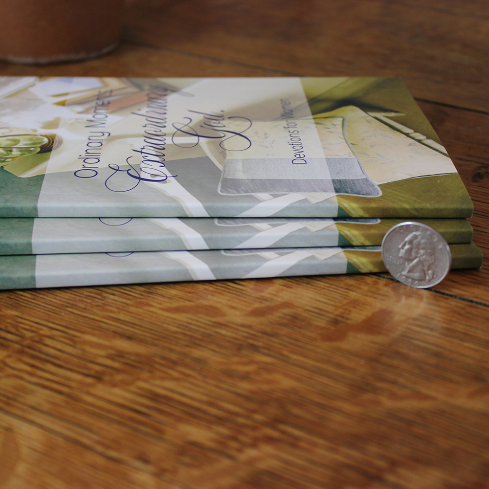 3 Christian Women's Devotion Book on table